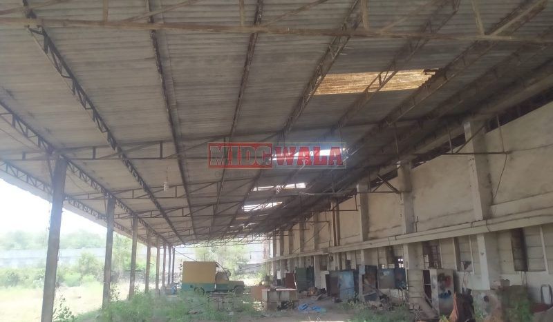 spacious and well-maintained industrial shed available for lease in Palaspe Phata Panvel, Navi Mumbai's TTC Industrial Area. The shed features ample workspace, ample power supply, and convenient access to transportation.