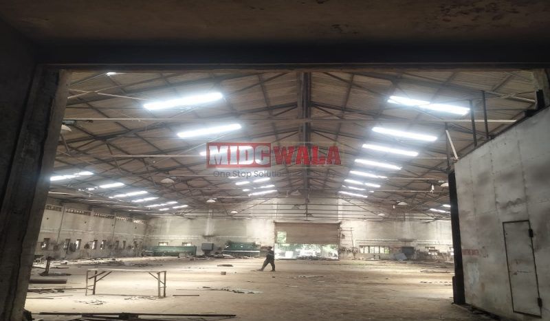 spacious and well-maintained industrial shed available for lease in Palaspe Phata Panvel, Navi Mumbai's TTC Industrial Area. The shed features ample workspace, ample power supply, and convenient access to transportation.