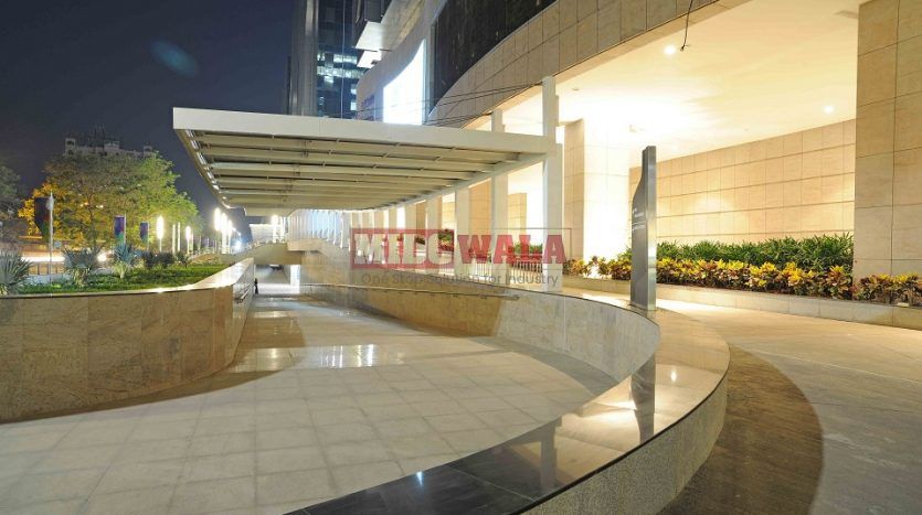 An image showcasing a office space at Seawood Grand Central Park, Navi Mumbai, featuring modern workstations, well-appointed conference rooms, and a vibrant work environment.