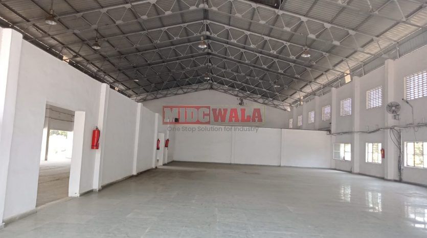 An image depicting a modern and spacious factory building situated in Taloja, Navi Mumbai. The building features ample workspace, advanced amenities, and strategic connectivity, making it an ideal choice for manufacturing and production operations.