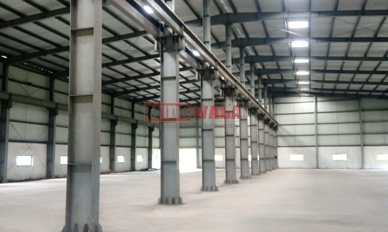 spacious and well-maintained industrial shed available for lease in Khopoli, Navi Mumbai's TTC Industrial Area. The shed features ample workspace, ample power supply, and convenient access to transportation.