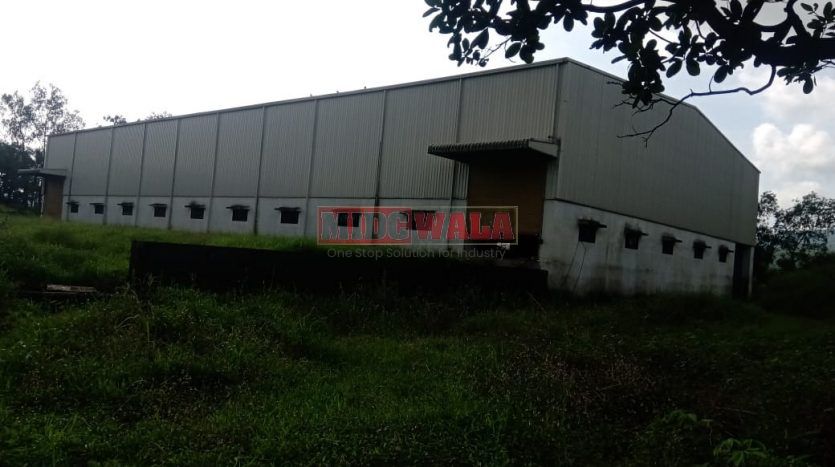 spacious and well-maintained industrial shed available for lease in Khopoli, Navi Mumbai's TTC Industrial Area. The shed features ample workspace, ample power supply, and convenient access to transportation.