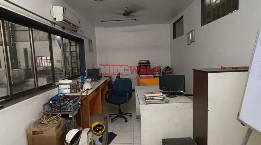 spacious and well-maintained industrial shed available for lease in Rabale, Navi Mumbai's TTC Industrial Area. The shed features ample workspace, ample power supply, and convenient access to transportation.