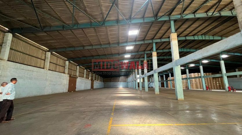 spacious and well-maintained industrial shed available for lease in Khopoli Khalapur, Navi Mumbai's TTC Industrial Area. The shed features ample workspace, ample power supply, and convenient access to transportation.