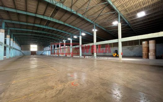 spacious and well-maintained industrial shed available for lease in Khopoli Khalapur, Navi Mumbai's TTC Industrial Area. The shed features ample workspace, ample power supply, and convenient access to transportation.