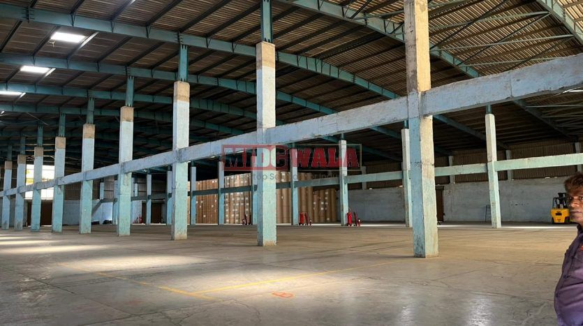 spacious and well-maintained industrial shed available for lease in Khopoli Khalapur, Navi Mumbai's TTC Industrial Area. The shed features ample workspace, ample power supply, and convenient access to transportation.