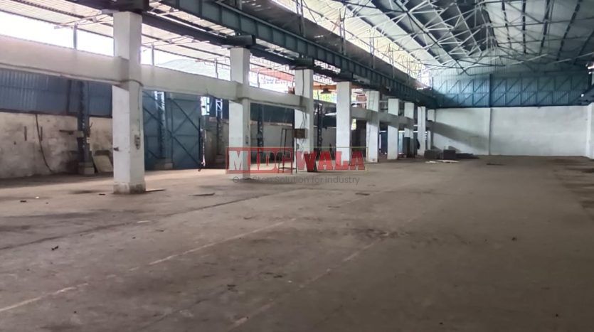 spacious and well-maintained industrial shed available for lease in Rabale, Navi Mumbai's TTC Industrial Area. The shed features ample workspace, ample power supply, and convenient access to transportation.