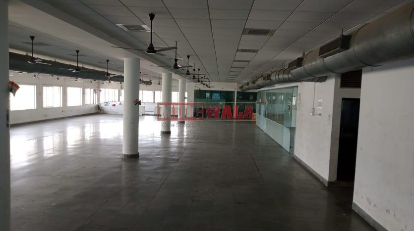 A spacious and modern industrial building available for lease in Navi Mumbai's Koper khairane Midc, TTC Industrial area. The building features abundant workspace, contemporary amenities, and a strategic location.