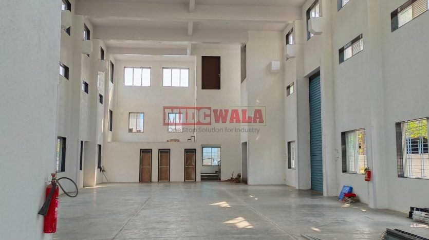 A spacious and modern RCC industrial building available for lease in Rabale Navi Mumbai's Koper khairane Midc, TTC Industrial area. The building features abundant workspace, contemporary amenities, and a strategic location.