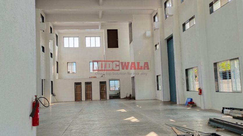 A spacious and modern RCC industrial building available for lease in Rabale Navi Mumbai's Koper khairane Midc, TTC Industrial area. The building features abundant workspace, contemporary amenities, and a strategic location.