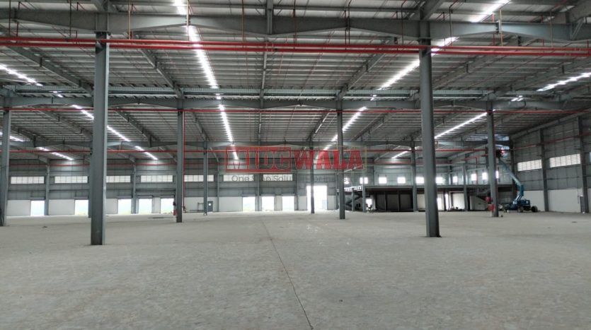 Large, modern warehouse in TTC Industrial Area, Taloja MIDC, Navi Mumbai. Suitable for storage and distribution.