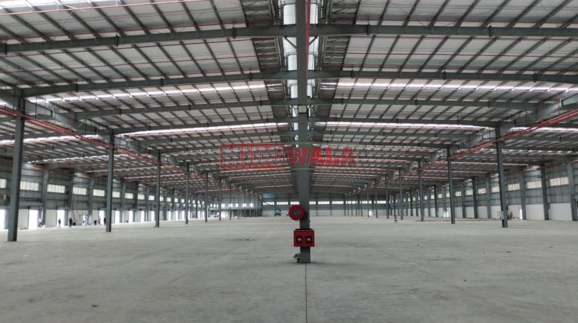 Large, modern warehouse in TTC Industrial Area, Taloja MIDC, Navi Mumbai. Suitable for storage and distribution.