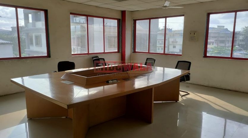 A modern and well-designed commercial building in Khairane, Navi Mumbai; , surrounded by lush greenery and offering a vibrant, professional work environment.