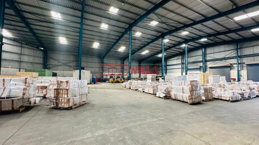 A modern and well-maintained warehouse in JNPT Road, Navi Mumbai, featuring ample storage space, efficient loading docks, and strategic connectivity, ideal for businesses seeking seamless storage and distribution solutions.