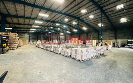 A modern and well-maintained warehouse in JNPT Road, Navi Mumbai, featuring ample storage space, efficient loading docks, and strategic connectivity, ideal for businesses seeking seamless storage and distribution solutions.