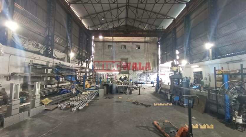 spacious and well-maintained Engineering shed available for lease in Rabale, Navi Mumbai's TTC Industrial Area. The shed features ample workspace, ample power supply, and convenient access to transportation.