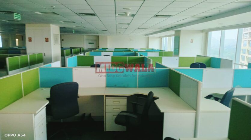 An image showcasing a fully furnished office space at Rupa Solitaire, MBP, Mahape, Navi Mumbai, featuring modern workstations, well-appointed conference rooms, and a vibrant work environment.