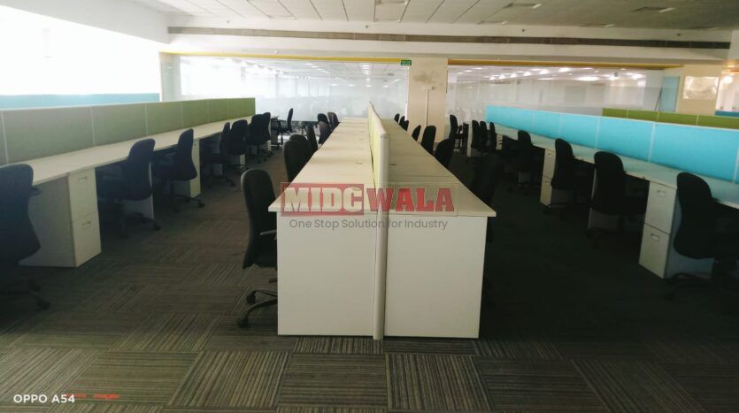 An image showcasing a fully furnished office space at Rupa Solitaire, MBP, Mahape, Navi Mumbai, featuring modern workstations, well-appointed conference rooms, and a vibrant work environment.