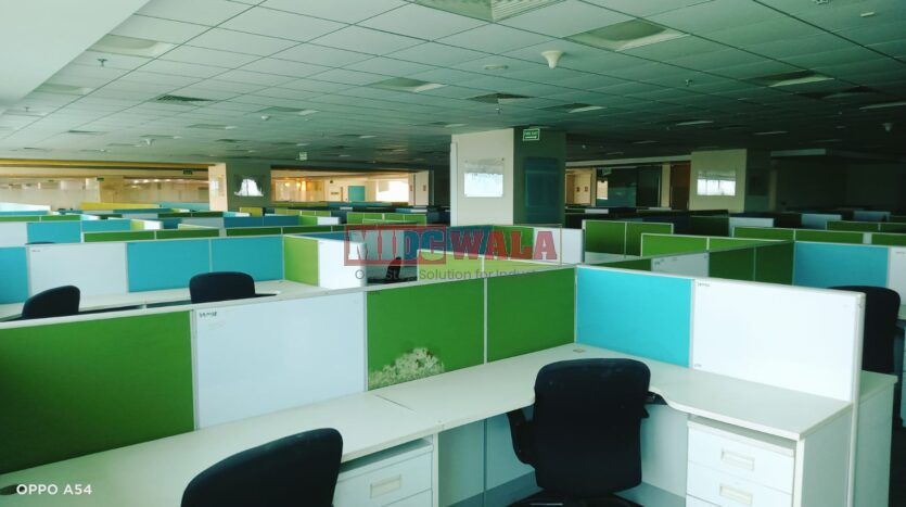 An image showcasing a fully furnished office space at Rupa Solitaire, MBP, Mahape, Navi Mumbai, featuring modern workstations, well-appointed conference rooms, and a vibrant work environment.