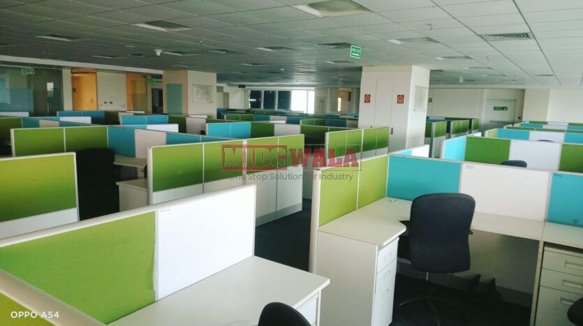 An image showcasing a fully furnished office space at Rupa Solitaire, MBP, Mahape, Navi Mumbai, featuring modern workstations, well-appointed conference rooms, and a vibrant work environment.