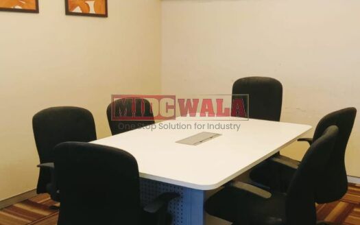 An image showcasing a fully furnished office space at Rupa Solitaire, MBP, Mahape, Navi Mumbai, featuring modern workstations, well-appointed conference rooms, and a vibrant work environment.