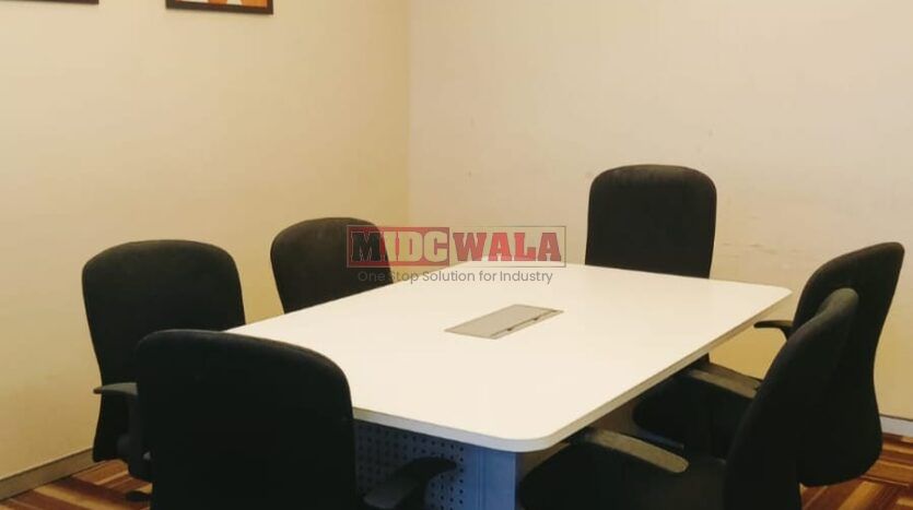 An image showcasing a fully furnished office space at Rupa Solitaire, MBP, Mahape, Navi Mumbai, featuring modern workstations, well-appointed conference rooms, and a vibrant work environment.