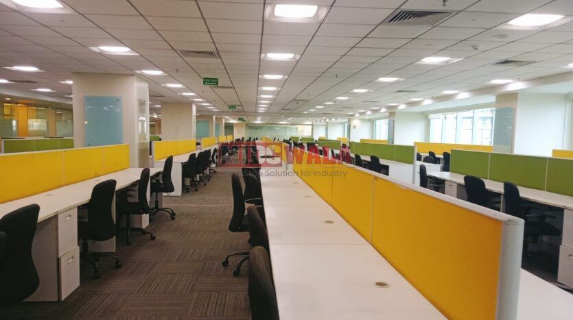 An image showcasing a fully furnished office space at Rupa Solitaire, MBP, Mahape, Navi Mumbai, featuring modern workstations, well-appointed conference rooms, and a vibrant work environment.