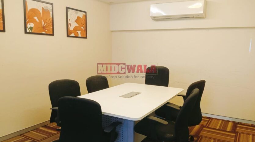 An image showcasing a fully furnished office space at Rupa Solitaire, MBP, Mahape, Navi Mumbai, featuring modern workstations, well-appointed conference rooms, and a vibrant work environment.