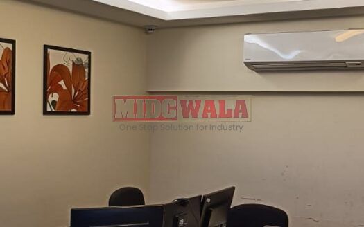 An image showcasing a fully furnished office space at Rupa Solitaire, MBP, Mahape, Navi Mumbai, featuring modern workstations, well-appointed conference rooms, and a vibrant work environment.
