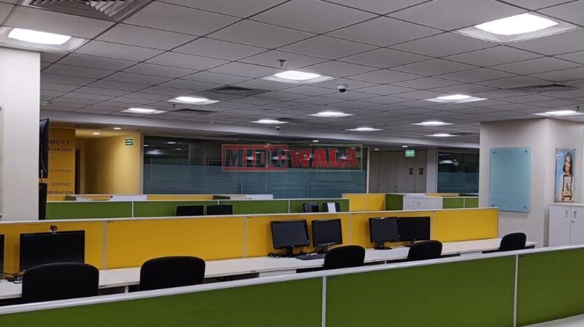 An image showcasing a fully furnished office space at Rupa Solitaire, MBP, Mahape, Navi Mumbai, featuring modern workstations, well-appointed conference rooms, and a vibrant work environment.