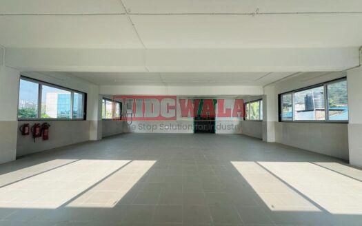 A spacious and modern RCC industrial building available for lease in Navi Mumbai's Nerul Midc, TTC Industrial area. The building features abundant workspace, contemporary amenities, and a strategic location.