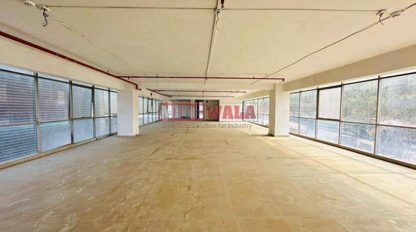 A spacious and modern Laboratory Space for lease in Navi Mumbai's Mahape Midc, TTC Industrial area. The building features abundant workspace, contemporary amenities, and a strategic location.