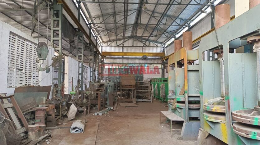 spacious and well-maintained industrial shed available for lease in Rabale, Navi Mumbai's TTC Industrial Area. The shed features ample workspace, ample power supply, and convenient access to transportation.