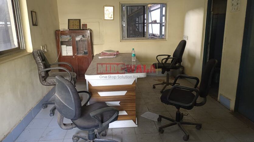 spacious and well-maintained industrial shed available for lease in Rabale, Navi Mumbai's TTC Industrial Area. The shed features ample workspace, ample power supply, and convenient access to transportation.