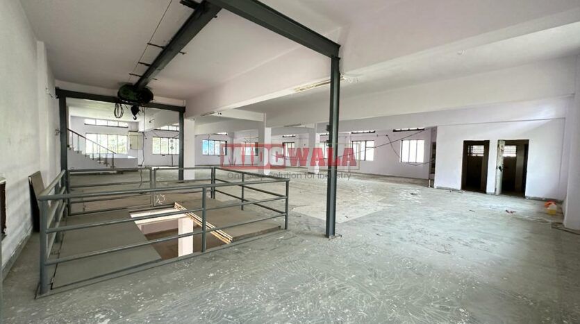 Large, modern warehouse in TTC Industrial Area, Turbhe, Navi Mumbai. Suitable for storage and distribution.