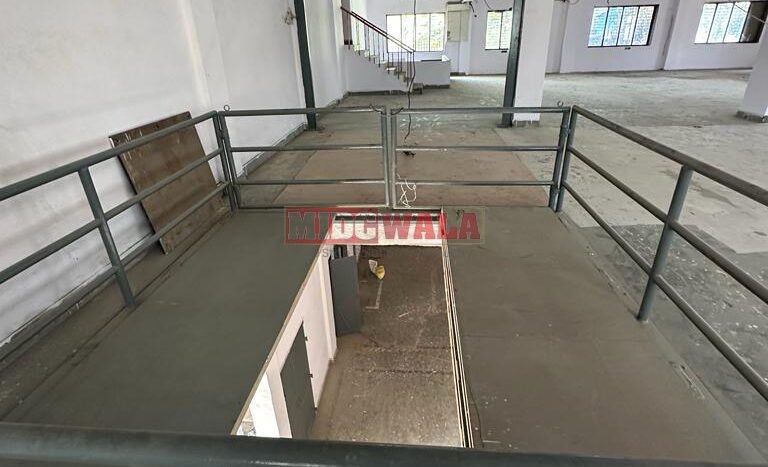 Large, modern warehouse in TTC Industrial Area, Turbhe, Navi Mumbai. Suitable for storage and distribution.