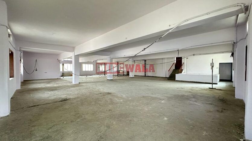 Large, modern warehouse in TTC Industrial Area, Turbhe, Navi Mumbai. Suitable for storage and distribution.