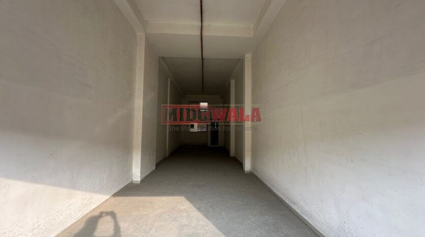 Large, modern warehouse in TTC Industrial Area, Turbhe, Navi Mumbai. Suitable for storage and distribution.