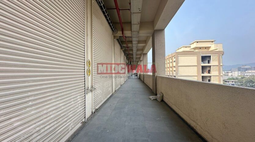 Large, modern warehouse in TTC Industrial Area, Turbhe, Navi Mumbai. Suitable for storage and distribution.