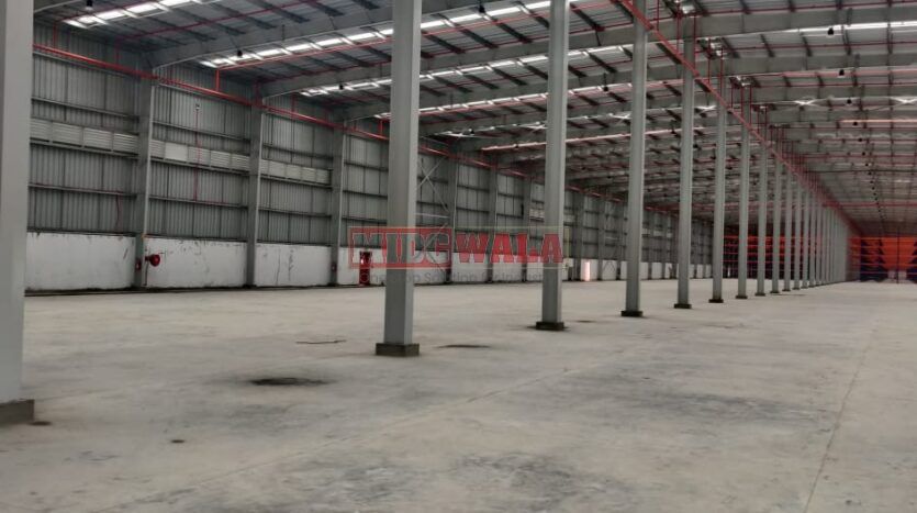 Large, modern warehouse in TTC Industrial Area, Taloja, Navi Mumbai. Suitable for storage and distribution.