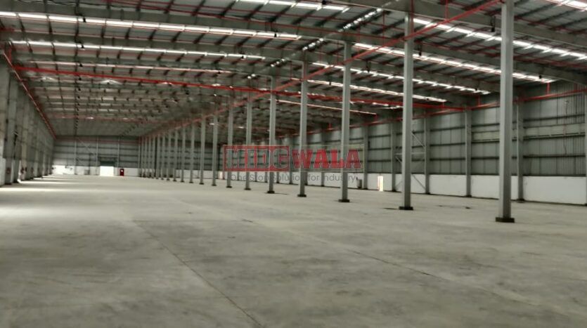 Large, modern warehouse in TTC Industrial Area, Taloja, Navi Mumbai. Suitable for storage and distribution.