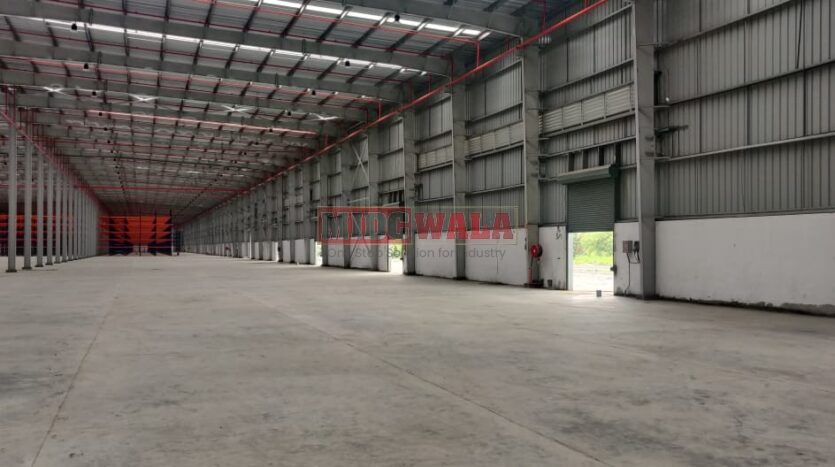 Large, modern warehouse in TTC Industrial Area, Taloja, Navi Mumbai. Suitable for storage and distribution.