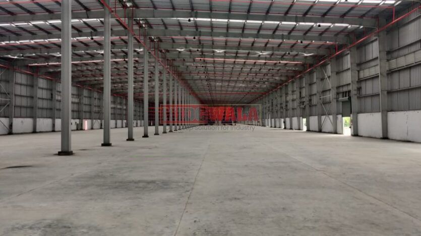 Large, modern warehouse in TTC Industrial Area, Taloja, Navi Mumbai. Suitable for storage and distribution.