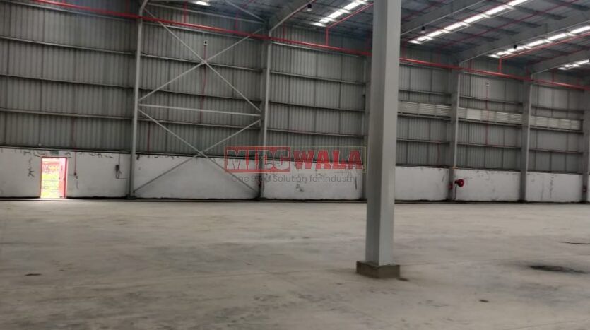 Large, modern warehouse in TTC Industrial Area, Taloja, Navi Mumbai. Suitable for storage and distribution.