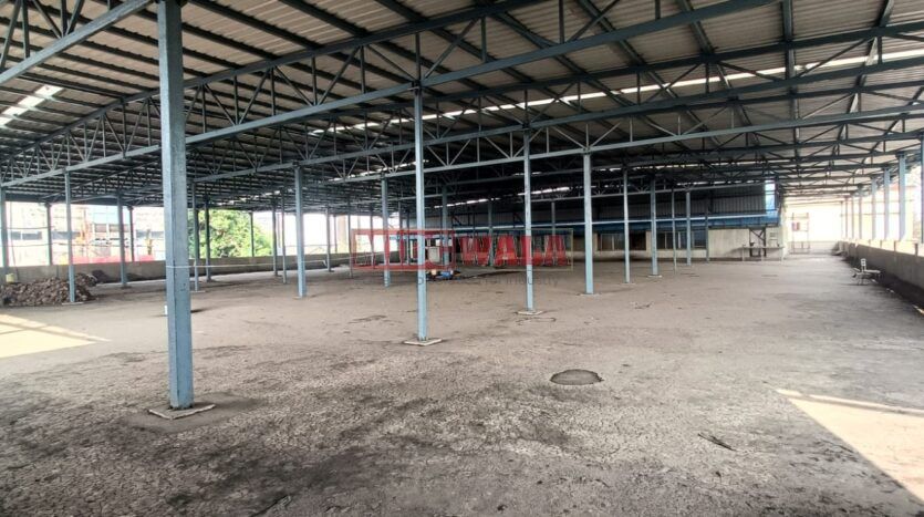 An image depicting a modern and spacious factory building situated in Taloja, Navi Mumbai. The building features ample workspace, advanced amenities, and strategic connectivity, making it an ideal choice for manufacturing and production operations.