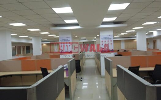 An image showcasing a fully furnished office space in MBP Mahape, Navi Mumbai, featuring modern workstations, well-appointed conference rooms, and a vibrant work environment.