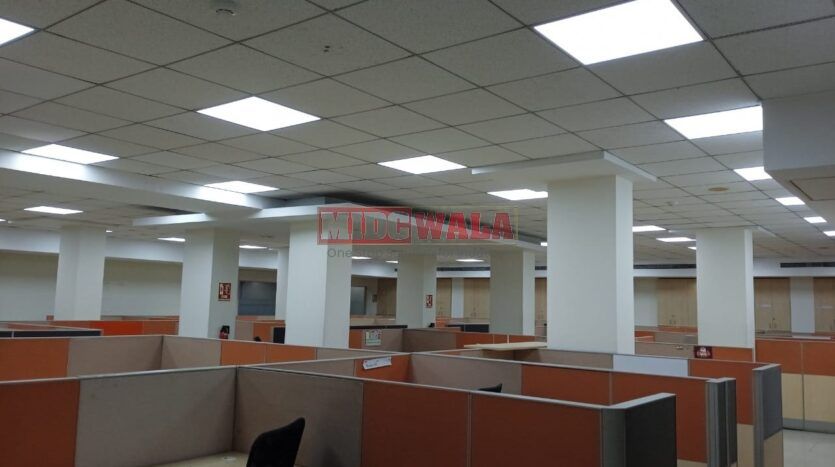 An image showcasing a fully furnished office space in MBP Mahape, Navi Mumbai, featuring modern workstations, well-appointed conference rooms, and a vibrant work environment.