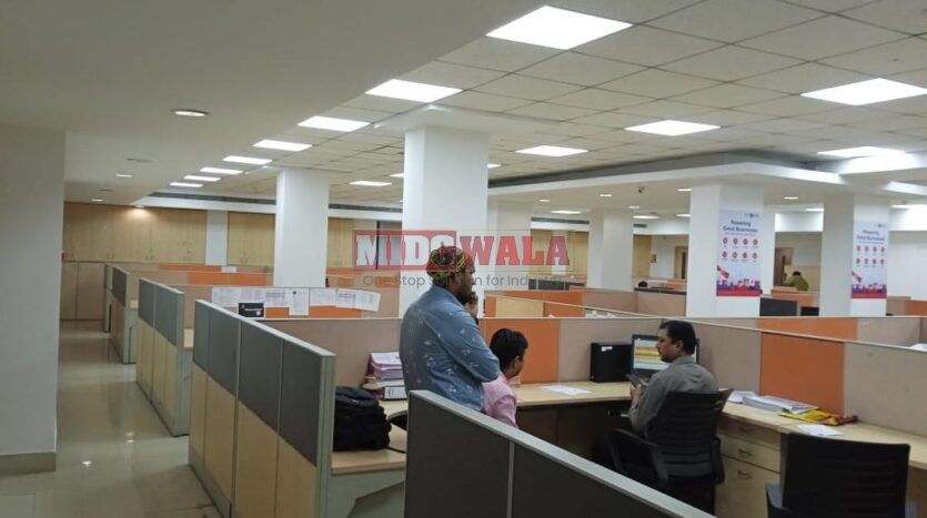 An image showcasing a fully furnished office space in MBP Mahape, Navi Mumbai, featuring modern workstations, well-appointed conference rooms, and a vibrant work environment.