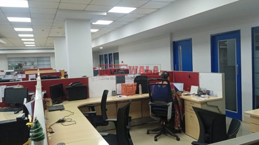 An image showcasing a fully furnished office space in MBP Mahape, Navi Mumbai, featuring modern workstations, well-appointed conference rooms, and a vibrant work environment.