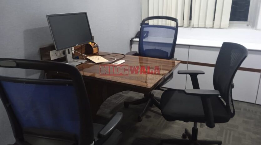 An image showcasing a fully furnished office space in MBP Mahape, Navi Mumbai, featuring modern workstations, well-appointed conference rooms, and a vibrant work environment.